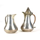 A PERSIAN TURKISH SILVER COFFEE POT Along with a Turkish silver jug. (largest 17cm)