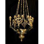 A 19TH CENTURY FRENCH EMPIRE GILT AND PATINATED BRONZE CHANDELIER In the form of six arms each