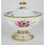 SWANSEA PORCELAIN, AN EARLY 19TH CENTURY SAUCE TUREEN Spherical form with gilt border, embossed