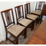 A SET OF SIX EARLY 20TH CENTURY AMBOYNA AND BEECH WOOD DINING CHAIRS Including one carver with