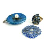 A VINTAGE 9CT GOLD AND GEM SET DRESS RING Having an arrangement of blue oval cut stones, together