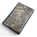 A CONTINENTAL SILVER CLAD NOTEBOOK Having embossed decoration of a courting couple in 18th Century