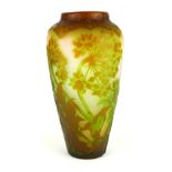 WITHDRAWN GALLE, AN EARLY 20TH CENTURY CAMEO GLASS OVOID VASE With carved and acid etched leaves