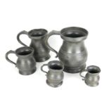 JAMES YATES, A SET OF EIGHT 19TH CENTURY PEWTER TANKARDS Graduating size from Quart to Gill touch