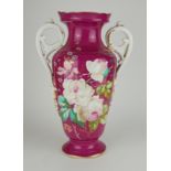 A 19TH CENTURY FRENCH PARIS PORCELAIN VASE Twin handles with hand painted floral decoration on