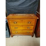 A SATIN WALNUT CHEST Three long drawers with brass military recessed fittings.