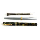 A VICTORIAN WHITE METAL AND HARDSTONE PROPELLING FOUNTAIN PEN AND PENCIL Having a shield form finial