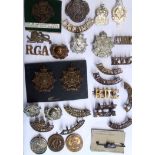 A COLLECTION OF THIRTY EARLY 20TH CENTURY BRITISH ARMY BADGES AND INSIGNIA 1st Battalion Volunteers,