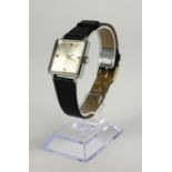 MOVADO, A VINTAGE STAINLESS STEEL GENT'S COCKTAIL WRISTWATCH Square form silver tone dial with