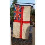 A WWII ROYAL NAVAL FLAG WHITE ENSIGNIA FLAG Having St. George's flag and Union Jack to upper left,