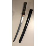 A JAPANESE WWII WAKIZASHI SWORD With black lacquered wooden scabbard, shagreen bound handle,