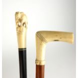 AN EARLY 20TH CENTURY ROSEWOOD WALKING STICK With ivory finial in the form of an Indian elephant,