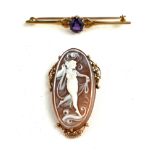 A 9CT GOLD AND SHELL CAMEO OVAL BROOCH With Art Nouveau design carved figure in a scrolled gold