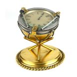 A RARE AND UNUSUAL VICTORIAN GILT BRONZE 'MILITARY DRUM' FORM CLOCK Circular silver tone dial with