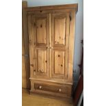 A VICTORIAN STYLE WARDROBE With two panelled, above a single drawer. (158cm x 57cm x 200cm)