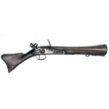 AN 18TH/19TH CENTURY FLINTLOCK BLUNDERBUSS With floral engraved barrel and lock, walnut stock,