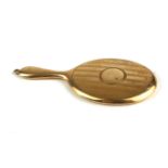 AN UNUSUAL EARLY 20TH CENTURY 9CT GOLD MINIATURE HAND MIRROR Having engine turned decoration. (