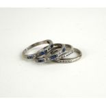 A SET OF FOUR ART DECO 18CT WHITE GOLD, DIAMOND AND SAPPHIRE STACKING RINGS Two rings set with