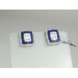 A PAIR OF 18CT WHITE GOLD, SAPPHIRE AND DIAMOND EARRINGS The arrangement of baguette and round cut