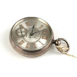 A VICTORIAN SILVER GENT'S POCKET WATCH Having a silver tone dial with gilt number markings,