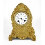 A FRENCH 19TH CENTURY GILT BRASS MANTLE CLOCK Having a Rococo form case with shell motifs and