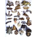 A COLLECTION OF THIRTY EARLY 20TH CENTURY BRITISH ARMY CAP BADGES Including Kings Own Hussars,