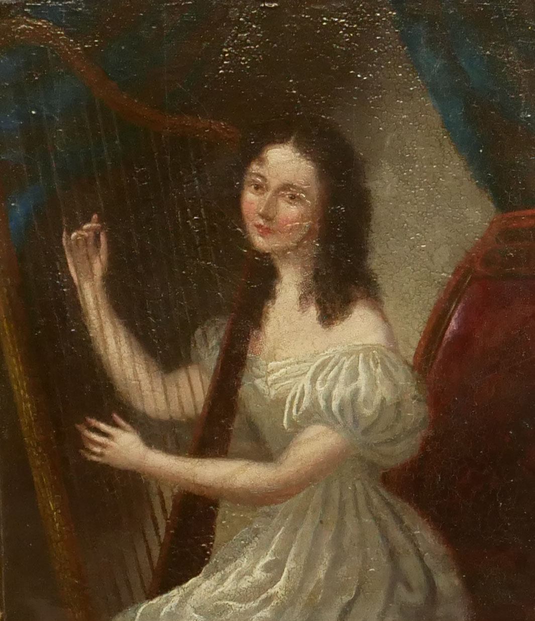 A 19TH CENTURY ENGLISH NAÏVE SCHOOL OIL ON PANEL Young woman playing the harp, unsigned, in a