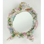 AN EARLY 20TH CENTURY POTS CHAPPEL DRESDEN PORCELAIN EASEL MIRROR Scrolled and pierced frame with