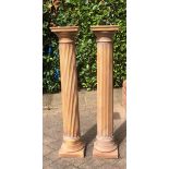 A PAIR OF CLASSICAL DESIGN LIMED WOOD REEDED COLUMNS. (129cm)