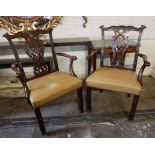 A PAIR OF CHIPPENDALE DESIGN MAHOGANY OPEN ARMCHAIRS With shaped and scroll back rail above a
