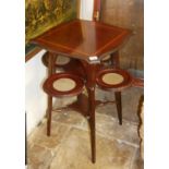 AN ART NOVEAU PERIOD MAHOGANY, SATINWOOD BANDED AND MARQUETRY INLAID OCCASIONAL TABLE With four