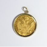 A 1 DUCAT COIN OF FRANZ JOSEPH I, DATED 1915 Mounted in unmarked yellow metal.