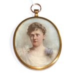A LATE 19TH/EARLY 20TH CENTURY OVAL MINIATURE PORTRAIT OF A LADY Wearing a lace dress and floral