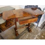 A 19TH CENTURY ROSEWOOD SOFA TABLE Small proportions, with single drawer, raised on two columns