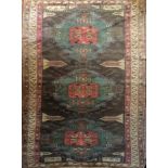 A TURKISH WOOLLEN RUNNER The central field in shades of pink, turquoise and brown. (295cm x 118cm)