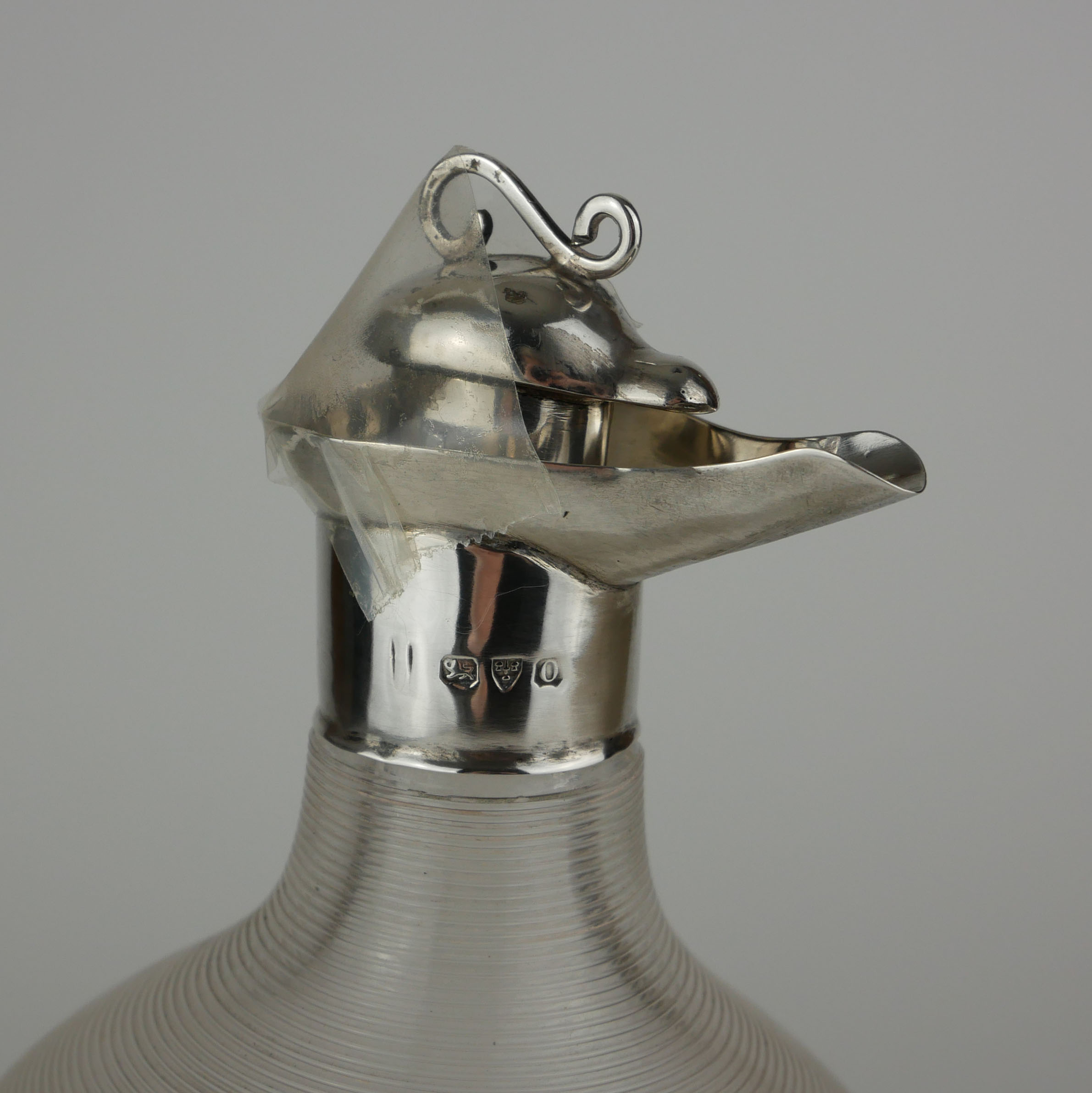 A VICTORIAN SILVER AND GLASS NOVELTY 'DUCK' CLARET JUG Having a silver stopper and collar, clear - Image 2 of 2