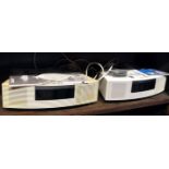 TWO BOSE RADIO/CD ALARM CLOCKS. Condition: stated by the owner, one is temperamental, with