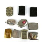 A COLLECTION OF EIGHT SILVER PLATED RECTANGULAR VESTA CASES Including a hunting dog, Isle of Man