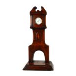 A VICTORIAN WALNUT NOVELTY POCKET WATCH HOLDER Carved as a miniature longcase clock, containing a