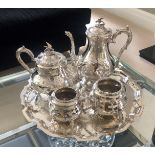 A 19TH CENTURY STYLE HEAVY SILVER PLATED FOUR PIECE TEA SET With bird finials and hand chased