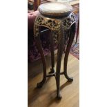 A 19TH CENTURY CHINESE HARDWOOD AND MARBLE JARDINAIRE STAND Circular marble inset on pierced