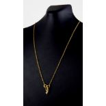 A VINTAGE 18CT GOLD AND DIAMOND WISHBONE NECKLACE The arrangement of graduated diamonds on a fine