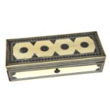 A 19TH CENTURY INDIAN VIZAGAPATAM IVORY GLOVE BOX Having geometric form ivory panels and sandal wood