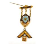 A 20TH CENTURY 9CT GOLD AND ENAMEL MASONIC MEDAL The blue enamel crest marked 'Exemplar Lodge no