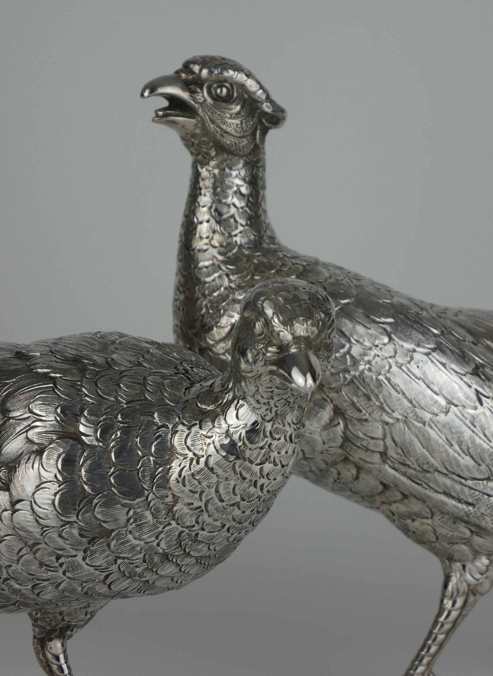 A PAIR OF CONTINENTAL SILVER PHEASANTS Male and female birds with fine detailed engraved decoration, - Image 2 of 2