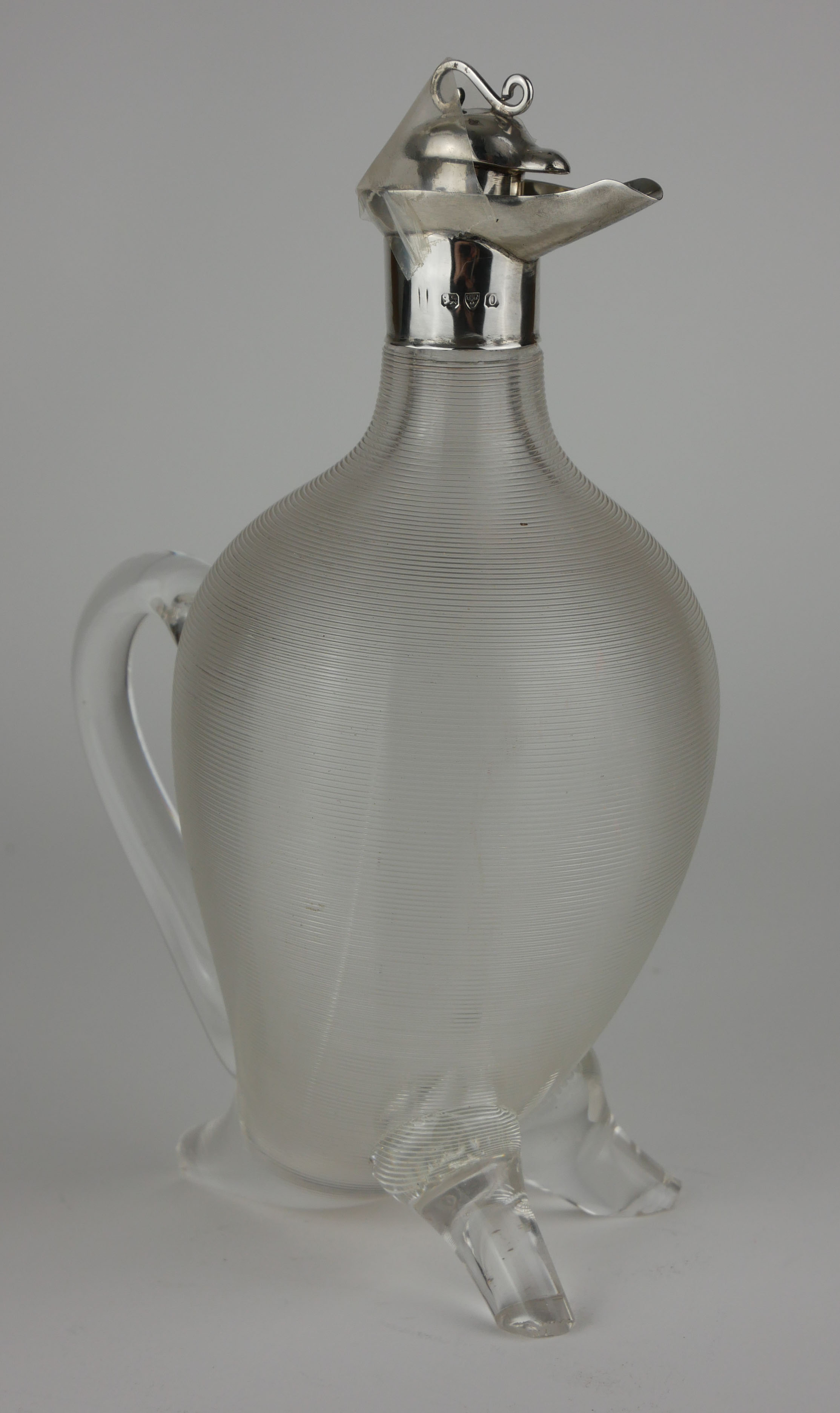 A VICTORIAN SILVER AND GLASS NOVELTY 'DUCK' CLARET JUG Having a silver stopper and collar, clear