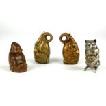 A COLLECTION OF FOUR EARLY 20TH CENTURY BRASS NOVELTY VESTA CASES Two elephant heads, a monkey and a