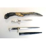 AN 18TH CENTURY CONTINENTAL HORN HANDLED KNIFE The steel blade with yellow metal inlay and hilt,