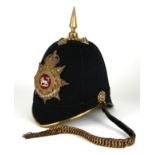 A VICTORIAN OFFICER'S SPIKED BLUE CLOTH HELMET OF THE KINGS OWN ROYAL LANCASTER REGIMENT with