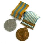 A QUEEN ELIZABETH KOREA CAMPAIGN MEDAL Awarded to 772357G W. Oxtoby LAMRN, together with a bronze